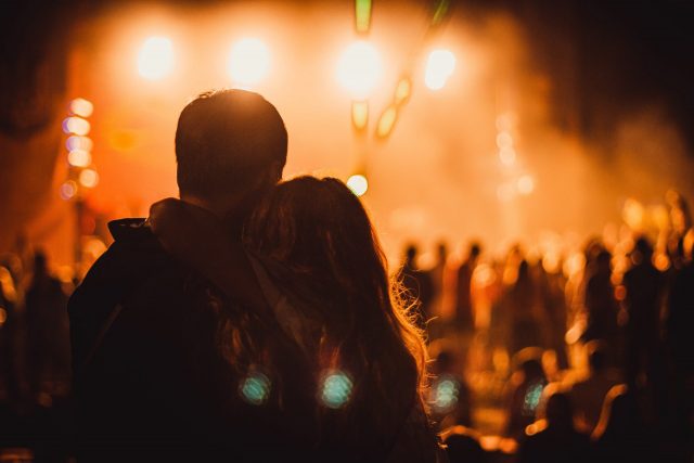 Couple Attending A Music Festival